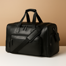 Men’s leather duffle bag with compartments, water-resistant finish, padded strap, and sleek design for travel and work.
