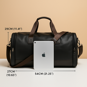 Men’s leather duffle bag with compartments, water-resistant finish, padded strap, and sleek design for travel and work.