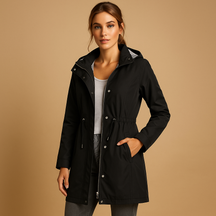 Women’s lightweight windjack with removable hood and long cut, water-repellent and perfect for all-weather outdoor adventures