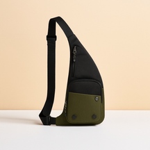 Lightweight nylon sling bag for men with zip compartments, buckle pocket, and adjustable strap—ideal for commuting, travel, and outdoor use.