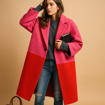 Elegant long autumn coat for women with practical pockets and a relaxed fit, ideal for stylish everyday wear in cooler seasons.