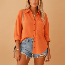 Long sleeve polo shirt for women in cotton blend with button-up collar and chest pocket, perfect for work or casual wear.