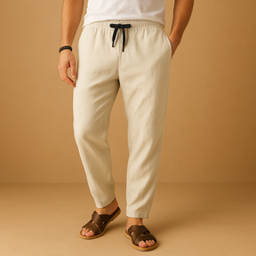 Loose cotton pants for men in grey, white, blue, maroon, beige, and black with breathable fabric and relaxed fit for casual and seasonal wear.