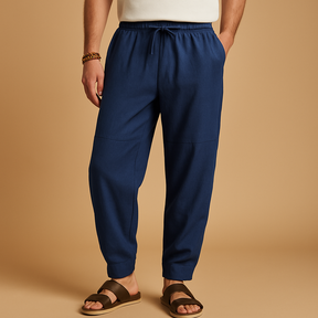 Loose cotton pants for men in grey, white, blue, maroon, beige, and black with breathable fabric and relaxed fit for casual and seasonal wear.