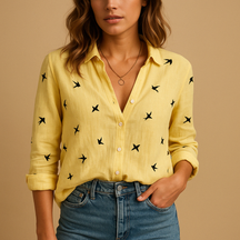 Loose-fit women’s casual blouse with breathable fabric, perfect for fall and spring wear, available in seasonal and neutral colours for versatile styling.