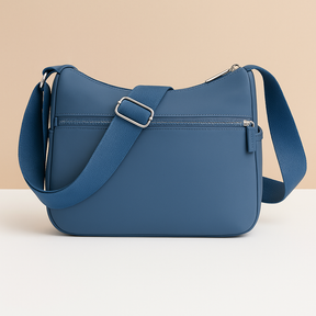 Luxury anti-theft messenger bag for women with zippered compartments and hidden pocket, perfect for travel and everyday use.