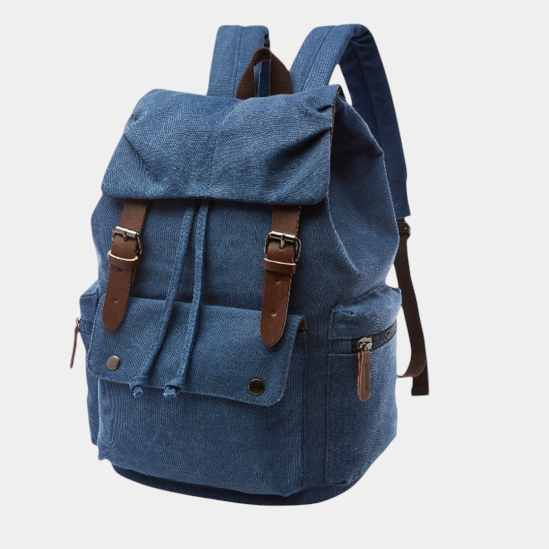 Men’s canvas travel backpack with padded laptop sleeve, drawstring and magnetic closures, ideal for work, hiking, or everyday use