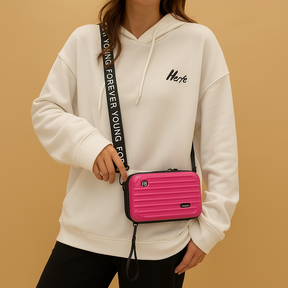 Stylish mini suitcase crossbody bag for women, durable and lightweight, perfect for daily essentials and fashion-forward looks.