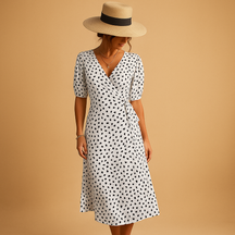 Polka dot summer wrap dress for women with V-neck and slit, ideal for casual days, beach parties, and garden events.