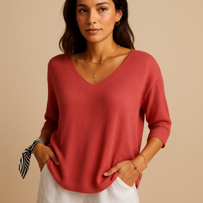 Relaxed elegant top for women in soft neutral tones with a modern fit, perfect for casual wear or at-home comfort.
