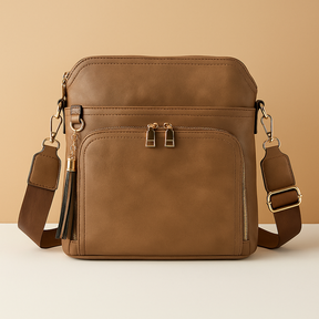 Women's RFID crossbody bag with anti-theft pocket and water-resistant faux leather exterior, convertible to clutch with tassel detail