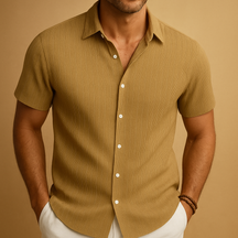 Men’s short-sleeved summer shirt in a solid color with a clean collar, perfect for warm days, casual events, or relaxed office wear.