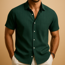 Men’s short-sleeved summer shirt in a solid color with a clean collar, perfect for warm days, casual events, or relaxed office wear.