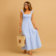 Sleeveless long summer dress for women in black, red, khaki, or sky blue, featuring breathable fabric and a flowy fit for day-to-night elegance.