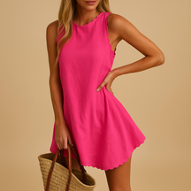 Sleeveless summer dress for women with a fitted bodice and flared skirt, ideal for beach parties, brunch, and stylish warm-weather occasions.