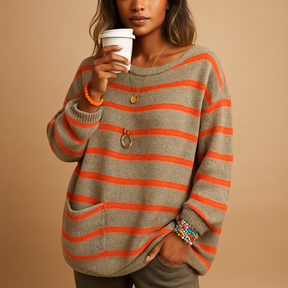 Women’s striped knit sweater with round neckline and long sleeves, perfect for casual styling in any season.