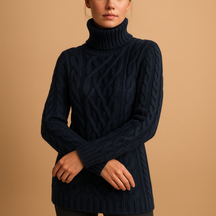 Turtleneck knitted sweater for women in beige and grey tones, designed for a flattering fit and elegant winter look.
