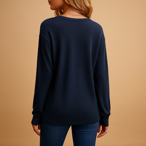 V-neck button blouse for women in black, white, red, green, or navy blue, with relaxed fit and elegant everyday style.