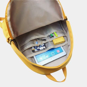 Waterproof travel backpack with multiple compartments, unisex design, ergonomic fit, and spacious interior for commuting, school, or daily adventures