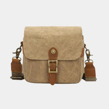 Men’s vintage canvas DSLR camera bag with shock-absorbing padded interior, adjustable dividers, and water-resistant batik fabric for travel or studio use