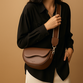 Vintage saddle crossbody bag for women with classic flap closure, adjustable strap, and organised compartments for daily use.