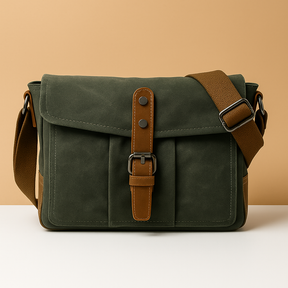 Men’s vintage messenger bag made from waterproof canvas with leather accents and adjustable strap, ideal for work, travel, or outdoor use