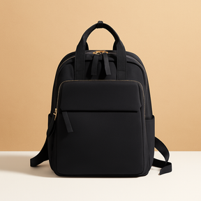 Water-repellent laptop backpack for women with padded 14-inch laptop sleeve, travel trolley sleeve, and stylish lightweight design.