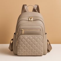 Water-resistant women’s backpack with anti-theft back pocket, adjustable straps, and spacious compartments, perfect for travel or everyday use.