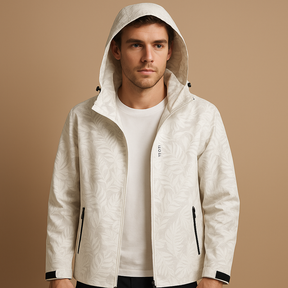 Men’s waterproof jacket with subtle leaf pattern, breathable fabric, adjustable hood, and zippered pockets, ideal for outdoor activities and daily wear.