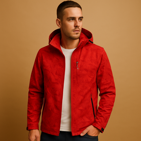 Men’s waterproof jacket with subtle leaf pattern, breathable fabric, adjustable hood, and zippered pockets, ideal for outdoor activities and daily wear.